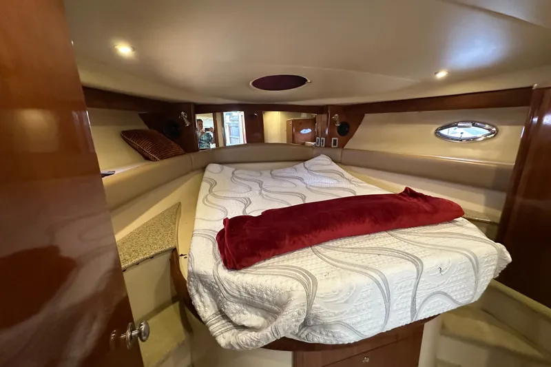 Slide: The Image of Luxurious cabin interior of 2007 Meridian 411 Sedan with cozy bed and elegant decor. - 97