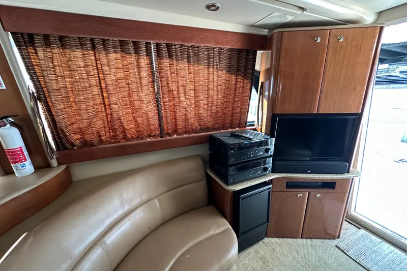 Slide: The Image of Interior of a 2007 Meridian 411 Sedan with entertainment system and leather seating. - 124