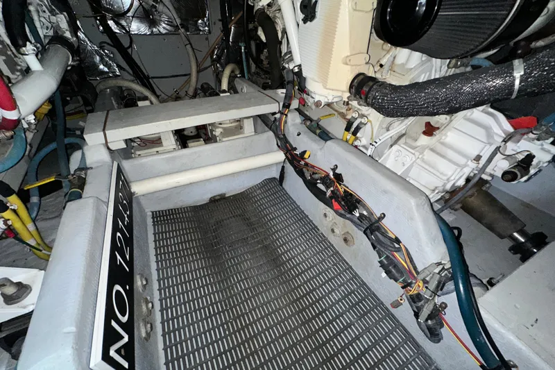 Slide: The Image of Engine room of a 2007 Meridian 411 Sedan with visible wiring and components. - 135