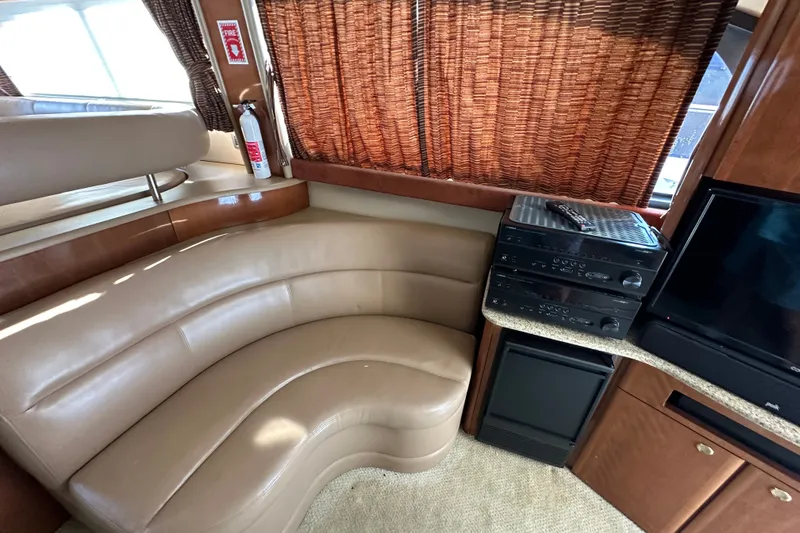Slide: The Image of Luxurious interior of 2007 Meridian 411 Sedan with leather seating and entertainment system. - 125