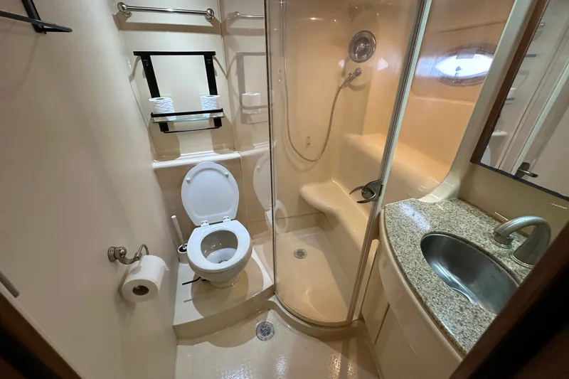 Slide: The Image of Bathroom interior of 2007 Meridian 411 Sedan yacht with shower, toilet, and sink. - 108