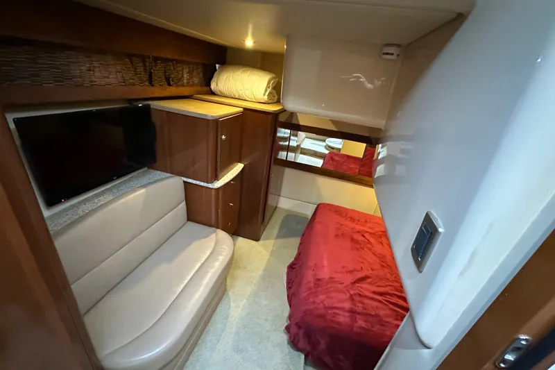 Slide: The Image of Interior of 2007 Meridian 411 Sedan with cozy seating, TV, and bed. - 73