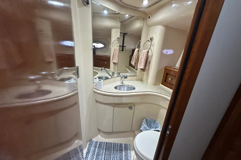 Slide: The Image of Luxurious bathroom in 2007 Meridian 411 Sedan yacht with modern fixtures and elegant design. - 79