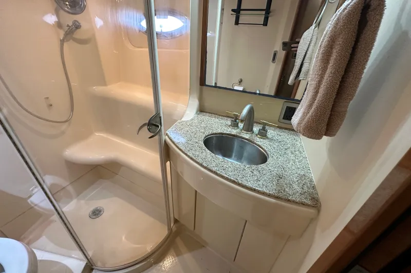 Slide: The Image of Bathroom interior of 2007 Meridian 411 Sedan yacht with shower and sink. - 110