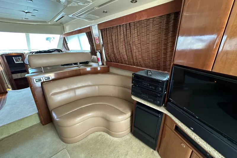 Slide: The Image of Luxurious interior of a 2007 Meridian 411 Sedan yacht with leather seating and entertainment system. - 41