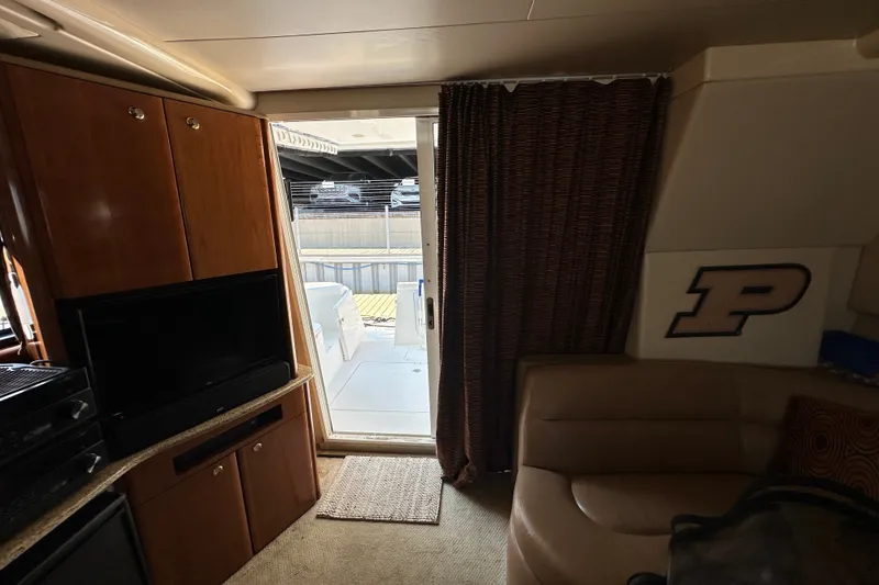 Slide: The Image of Interior of 2007 Meridian 411 Sedan yacht with cozy seating and sliding door. - 111