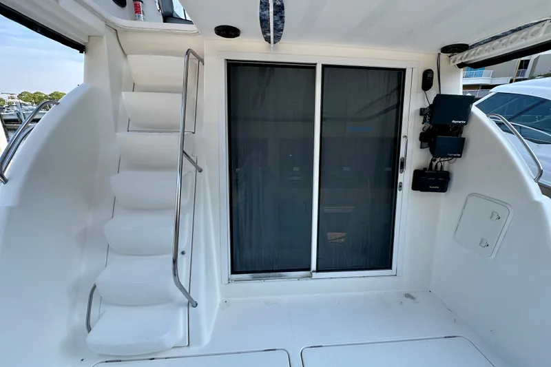 Slide: The Image of 2007 Meridian 411 Sedan yacht interior with stairs and sliding glass door. - 37