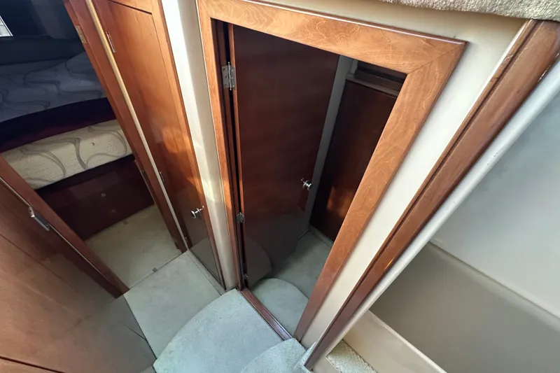 Slide: The Image of Interior view of 2007 Meridian 411 Sedan, featuring wooden doors and cozy cabin space. - 61