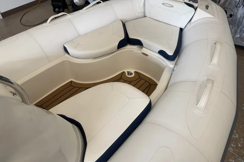Slide: The Image of Interior view of a 2020 Zodiac Yachtline 440 inflatable boat with cushioned seating. - 9