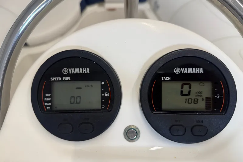 Slide: The Image of Yamaha speed and tachometer gauges on 2020 Zodiac Yachtline 440 dashboard. - 13