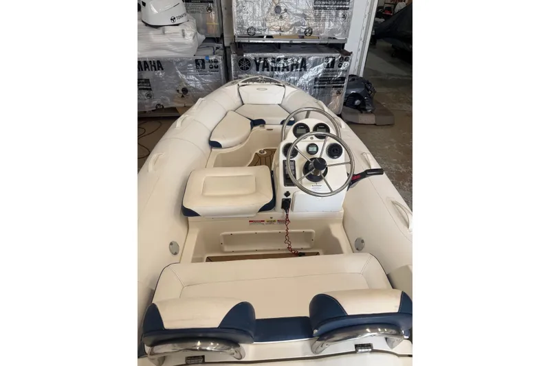 Slide: The Image of 2020 Zodiac Yachtline 440 inflatable boat interior with steering console and seating. - 8