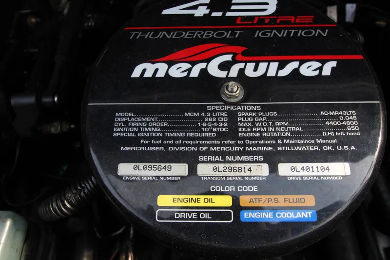 Slide: The Image of MerCruiser engine cover with specifications and serial numbers, Bryant 182, 1999 model. - 16