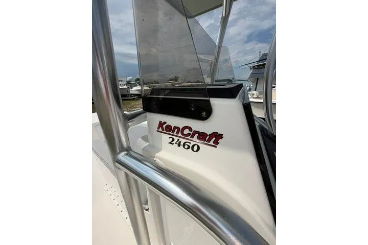 Slide: The Image of 2024 KenCraft 2460 Bayrider boat console with logo and railing. - 32