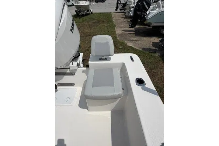 Slide: The Image of 2024 KenCraft 2460 Bayrider boat with cushioned seating and Yamaha engine. - 21