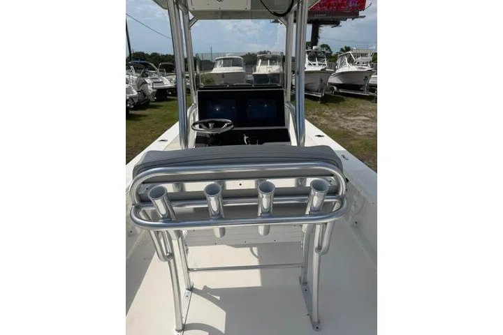 Slide: The Image of 2024 KenCraft 2460 Bayrider boat interior with rod holders and steering console. - 23