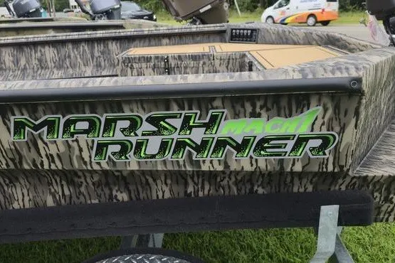 Slide: The Image of 2027 Havoc 1656 MRST MACH 1 boat with "Marsh Runner" decal in camouflage design. - 14
