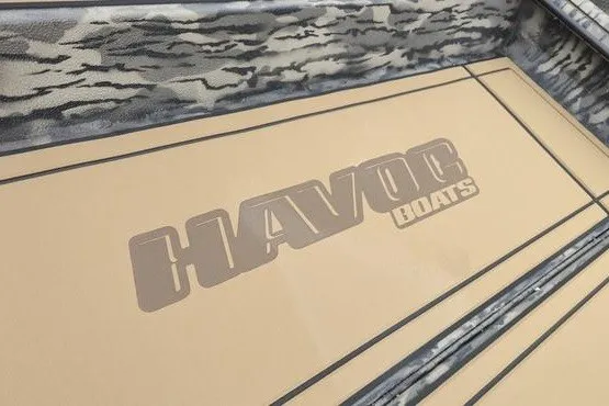 Slide: The Image of 2027 Havoc 1656 MRST MACH 1 boat interior with camouflage design and logo. - 8