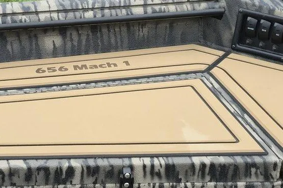 Slide: The Image of 2027 Havoc 1656 MRST MACH 1 boat interior with camouflage design and control panel. - 11