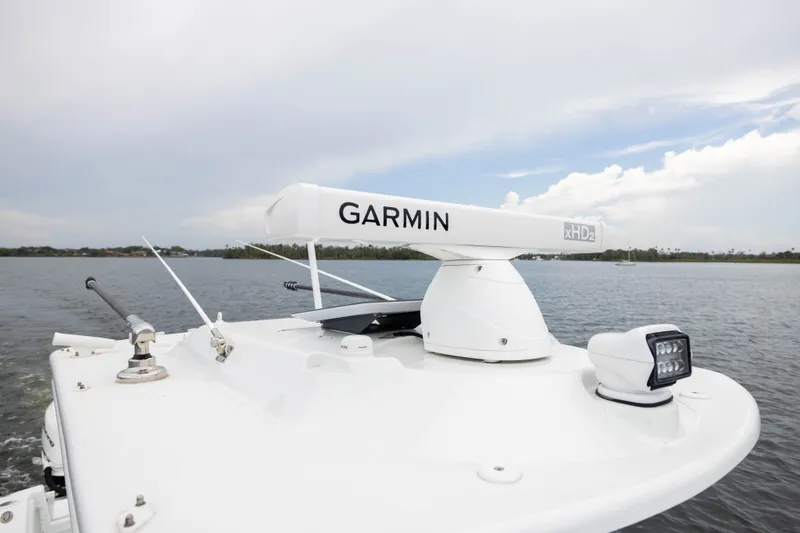 Slide: The Image of 2019 Yellowfin 36 Offshore boat with Garmin xHD2 radar on calm waters. - 21