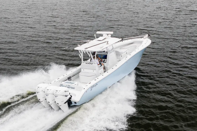 Slide: The Image of 2019 Yellowfin 36 Offshore boat cruising on open water. - 6
