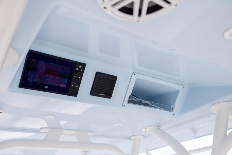 Slide: The Image of 2019 Yellowfin 36 Offshore boat interior with electronic display and speaker system. - 32