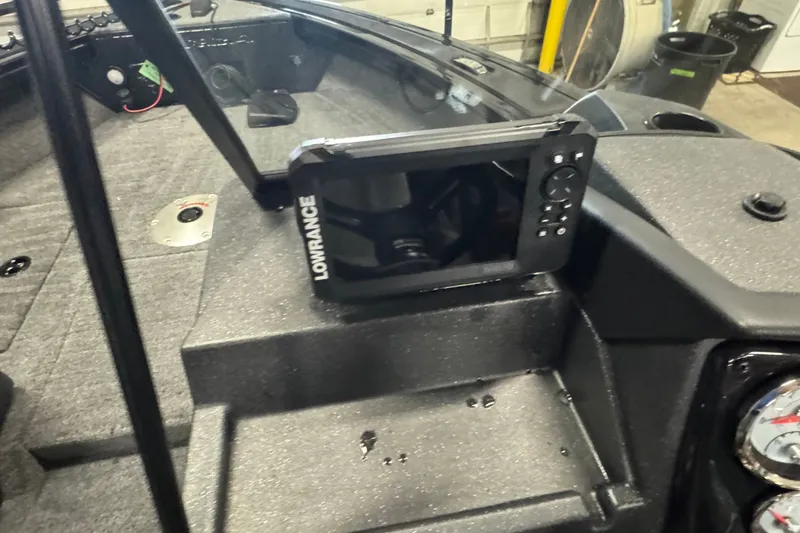 Slide: The Image of 2026 Tracker Targa V-18 Combo boat dashboard with Lowrance fish finder. - 13