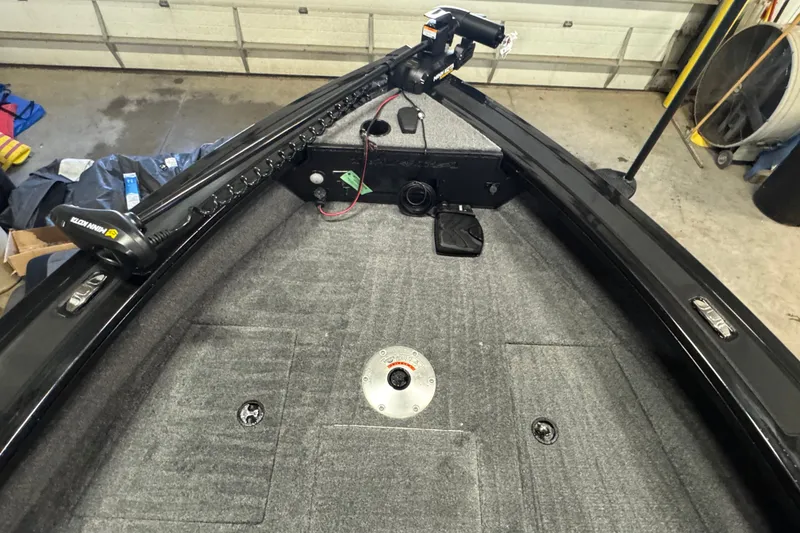 Slide: The Image of 2026 Tracker Targa V-18 Combo boat interior with Minn Kota trolling motor. - 16
