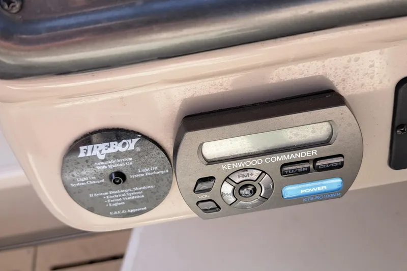 Slide: The Image of Kenwood Commander and Fireboy system on 2007 Monterey 250 Cruiser dashboard. - 13