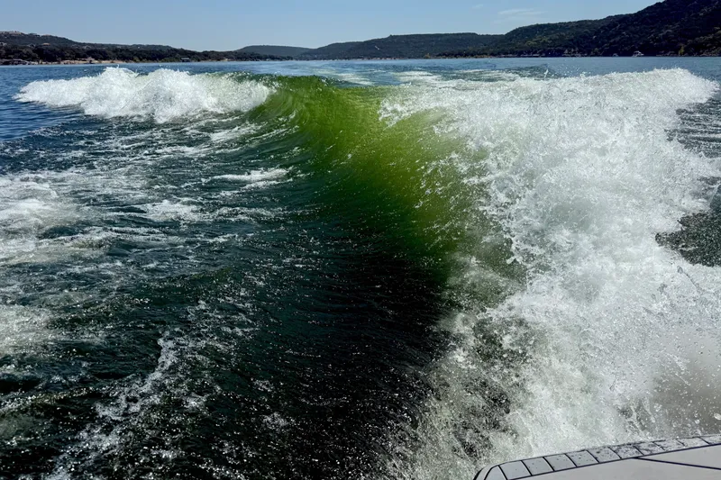 Slide: The Image of Wake created by 2018 Malibu Wakesetter 21 MLX on a scenic lake. - 35