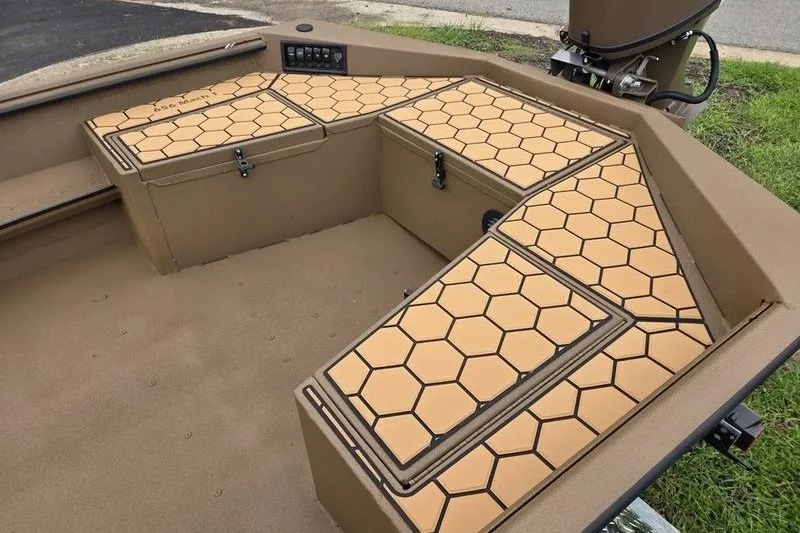 Slide: The Image of 2027 Havoc 1656 MRST MACH 1 boat interior with hexagonal patterned deck. - 10