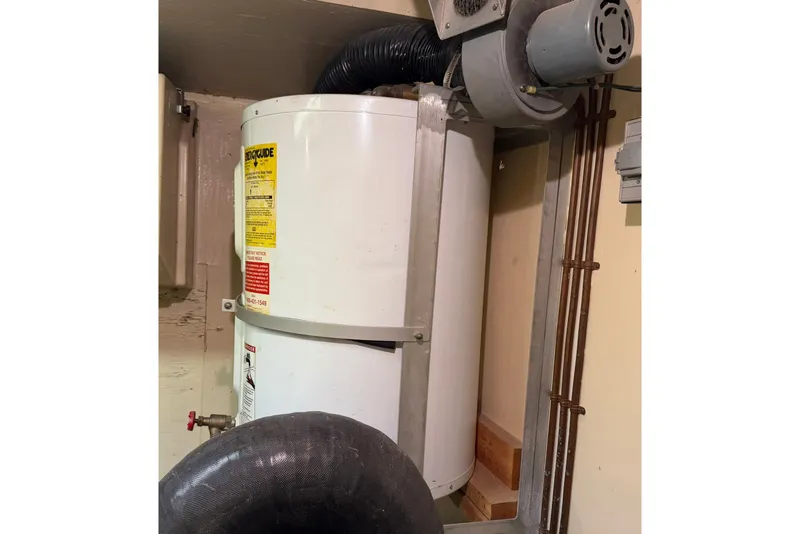 Slide: The Image of Water heater in 1986 Hatteras 63 Cockpit Motor Yacht engine room. - 82
