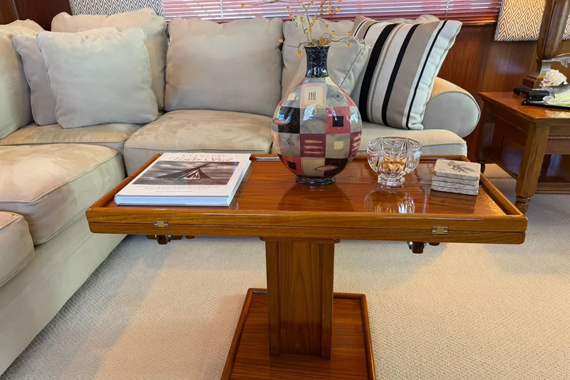 Slide: The Image of Luxurious interior of 1986 Hatteras 63 Cockpit Motor Yacht with elegant decor and cozy seating. - 13
