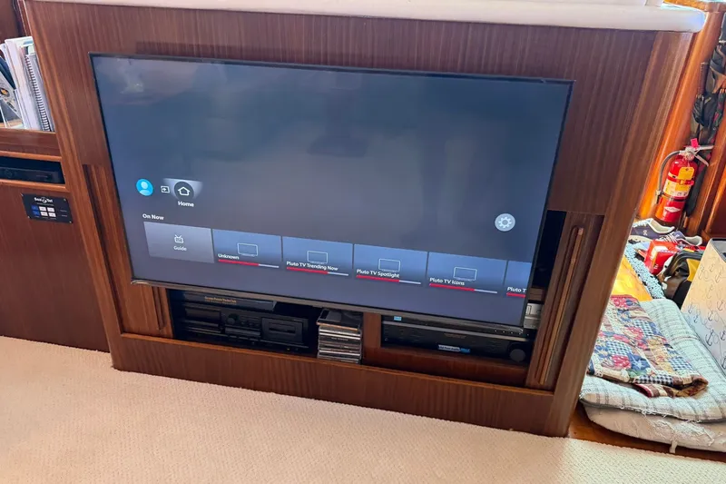 Slide: The Image of Entertainment system on 1986 Hatteras 63 Cockpit Motor Yacht with TV and media equipment. - 14