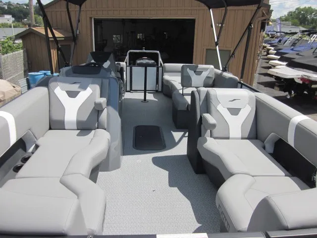 Slide: The Image of The image shows the spacious deck of a 2027 Evotti 521 QL with gray upholstered seating. - 9