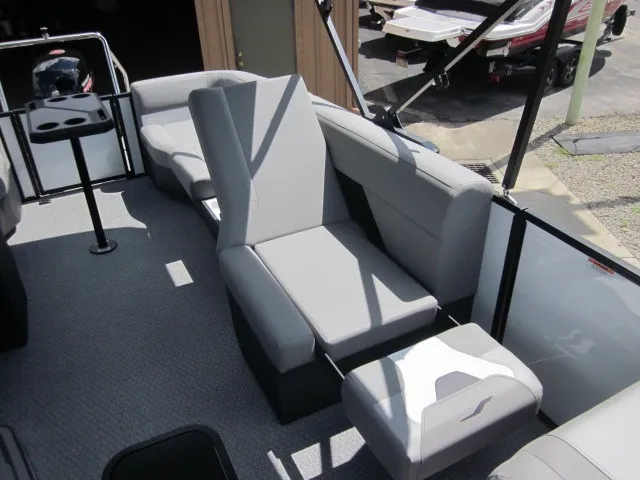 Slide: The Image of The image shows the interior of a 2027 Evotti 521 QL with gray upholstered seating. - 22
