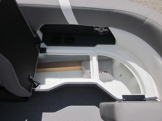 Slide: The Image of The image shows the storage area of a 2027 Evotti 521 QL boat with gray upholstery. - 11