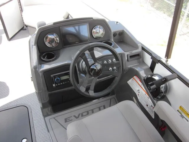 Slide: The Image of The image shows the cockpit of a 2027 Evotti 521 QL with a modern helm station. - 15