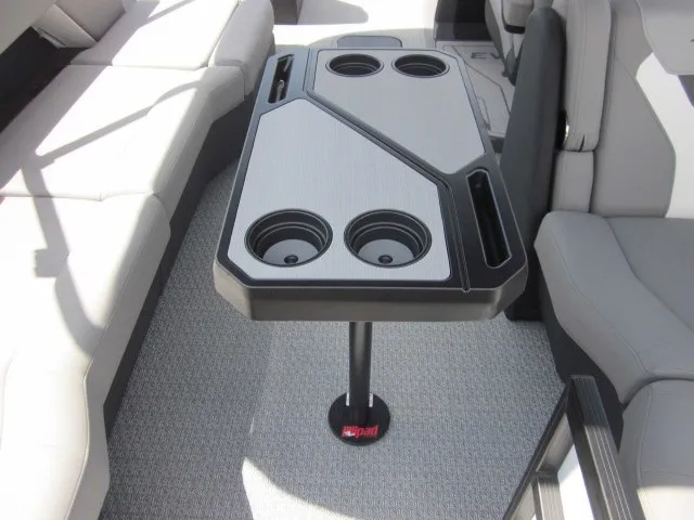 Slide: The Image of The image shows the interior of a 2027 Evotti 521 QL boat with a modern table. - 26