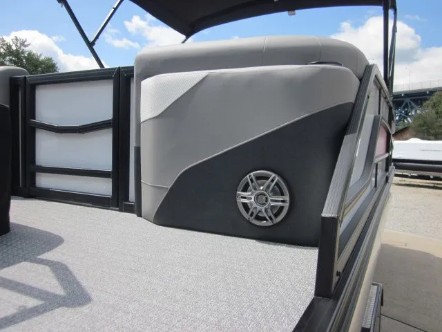 Slide: The Image of The image shows the deck of an Evotti 521 QL boat with modern speakers. - 27