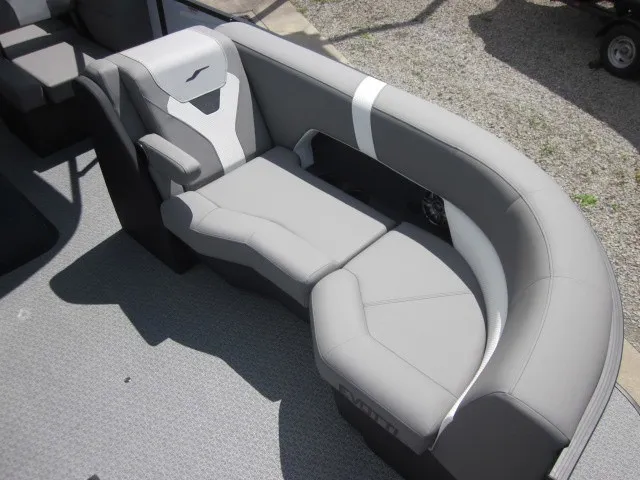 Slide: The Image of The image shows a gray upholstered seating area on a boat, featuring modern, curved lines. - 10