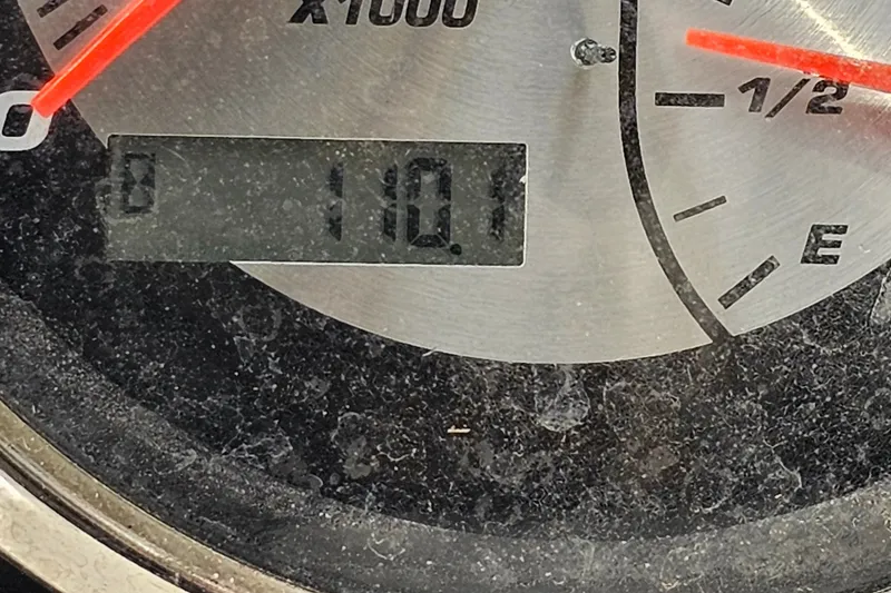 Slide: The Image of Close-up of a 2017 Hurricane SunDeck Sport 188 OB fuel gauge showing 110.1 hours. - 18