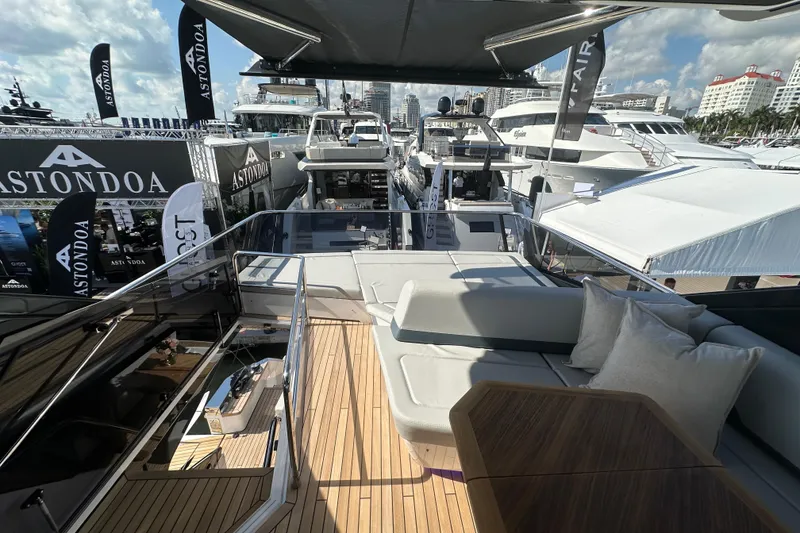 Slide: The Image of Flybridge view of 2026 Fairline Squadron 58 yacht at a boat show. - 52