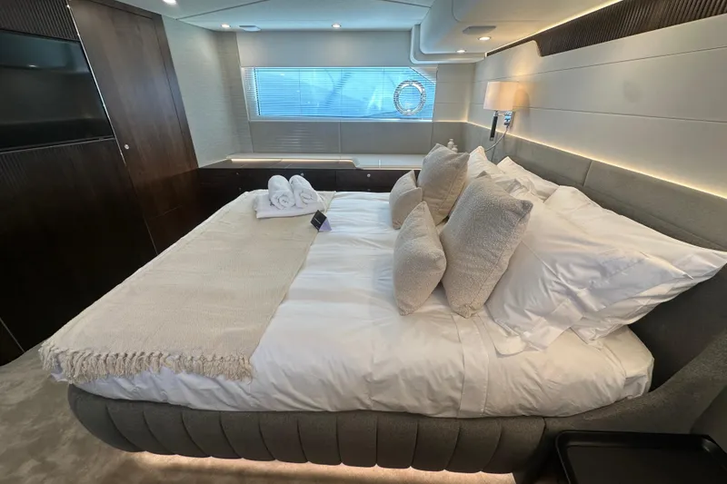 Slide: The Image of Luxurious bedroom interior of 2026 Fairline Squadron 58 yacht with elegant bedding. - 39