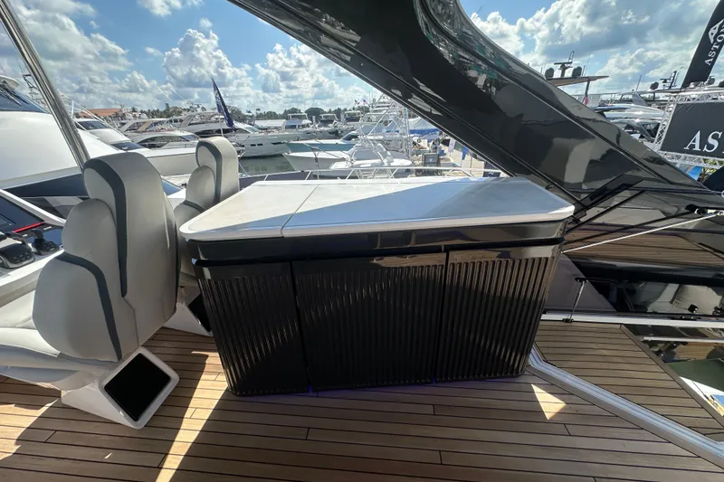 Slide: The Image of Luxury yacht interior of 2026 Fairline Squadron 58 with sleek seating and cabinetry. - 53