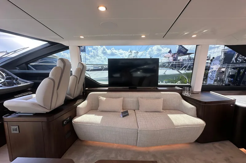 Slide: The Image of Luxurious interior of 2026 Fairline Squadron 58 yacht with plush seating and modern design. - 20
