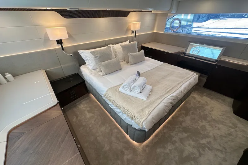 Slide: The Image of Luxurious bedroom interior of 2026 Fairline Squadron 58 yacht with elegant decor. - 41