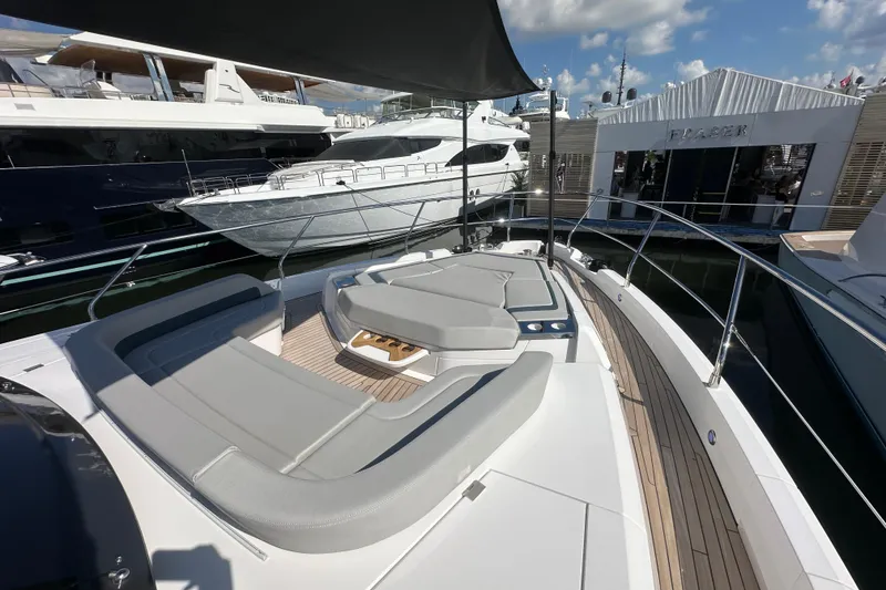 Slide: The Image of Luxurious 2026 Fairline Squadron 58 yacht with spacious deck and modern seating. - 61