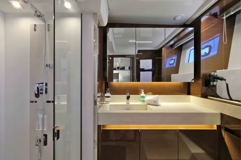 Slide: The Image of Luxurious bathroom interior of 2022 Prestige 590 yacht with modern fixtures and elegant design. - 57