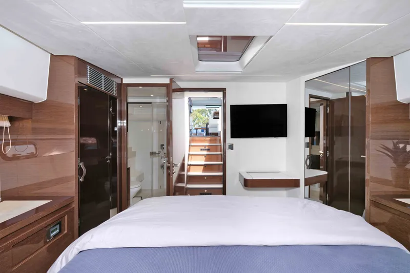 Slide: The Image of Luxurious interior of 2022 Prestige 590 yacht, featuring modern design and elegant wood finishes. - 46
