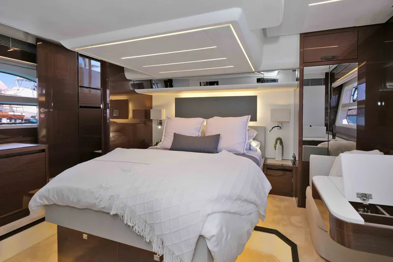 Slide: The Image of Luxurious interior of 2022 Prestige 590 yacht with elegant bedroom design. - 49